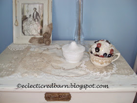 Eclectic Red Barn: White side table with vntage doilies