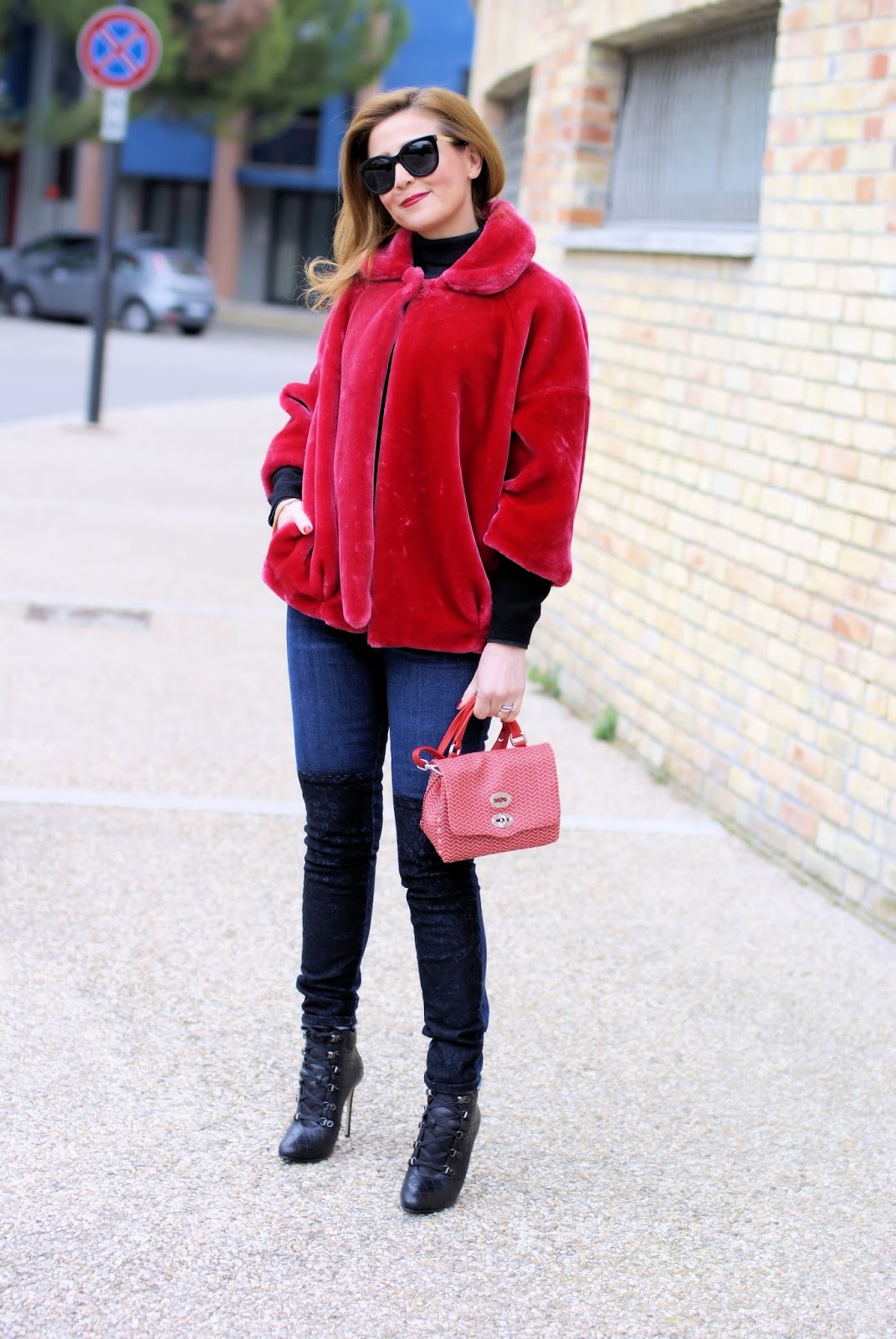 How to wear a red faux fur jacket on Fashion and Cookies fashion blog, fashion blogger style