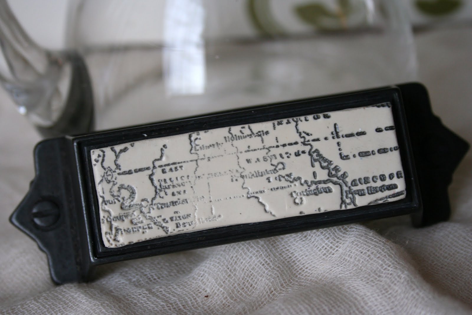 . See the lovely Faded Map Drawer Pulls on The Upcycle Furniture Co.
