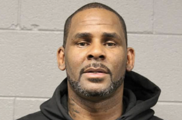 R Kelly spends another night in jail because he cannot come up with the $100,000 bail, while prosecutors describe how he STILL met underage girls, and even invited one back to his house, during his child porn trial