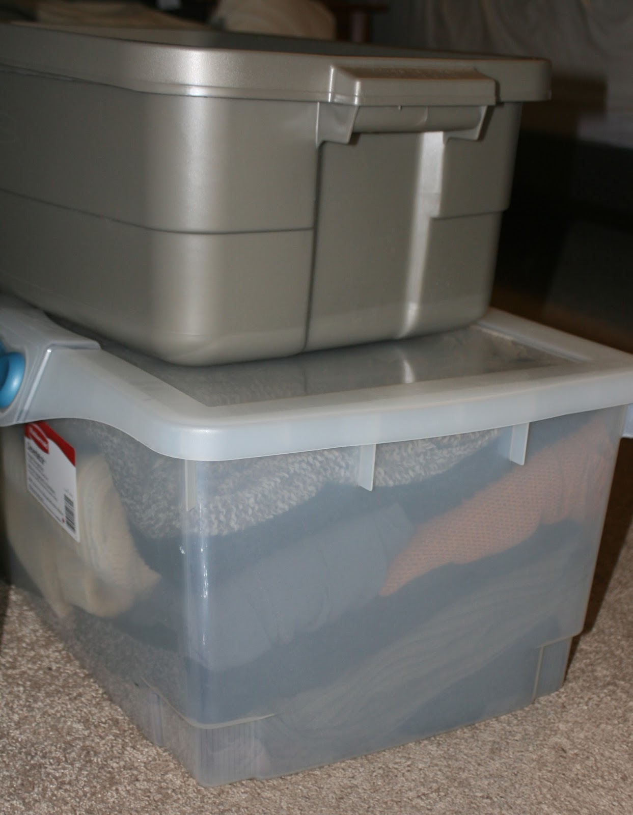 Organizing Our Family Home Using suitcases as storage