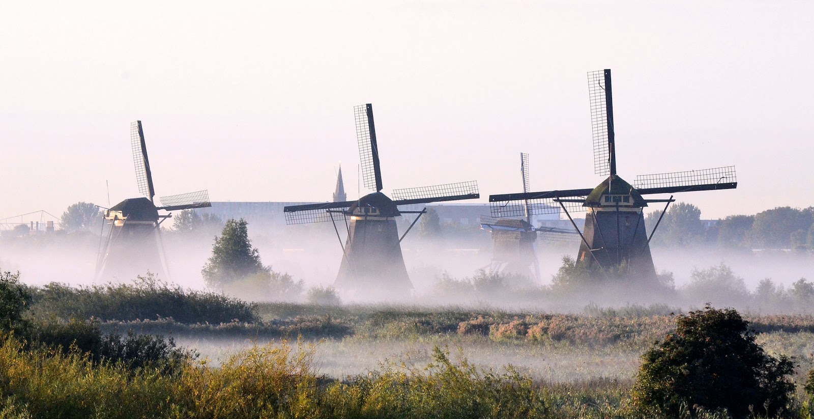 Kinderdijk Mills in Holland is one of Overby's 'One-day Wanders' mentioned in her European guidebook to walking adventures throughout the continent. Photo: © EuroTravelogue.com. Unauthorized use is prohibited. Kinderdijk Mills in Holland is one of Overby's 'One-day Wanders' mentioned in her European guidebook to walking adventures throughout the continent. Photo: © EuroTravelogue.com. Unauthorized use is prohibited.
