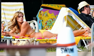 Ashley Greene wears a Yellow Bikini at New York