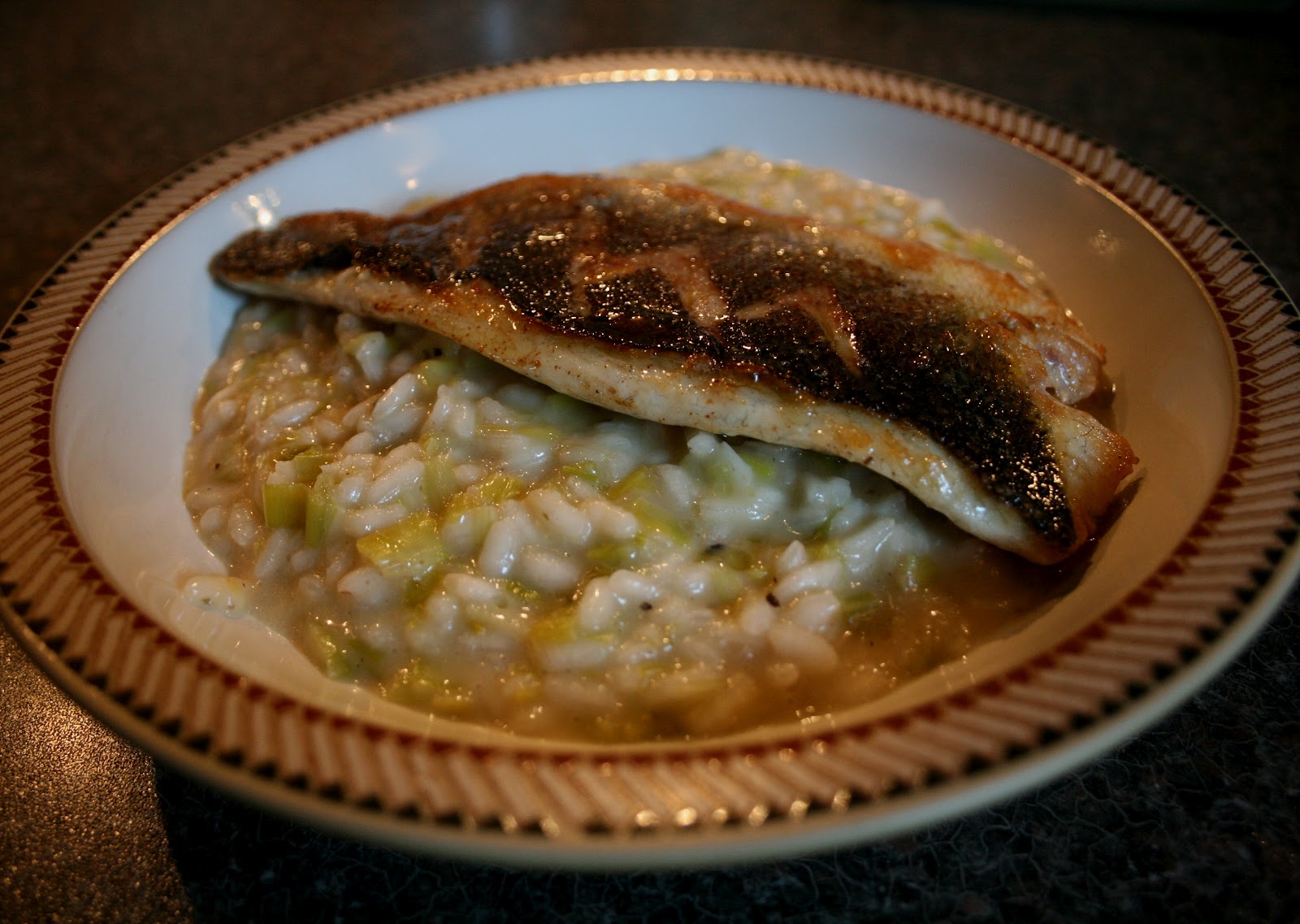 A Pinch Of Passion Pan fried sea bass perched on a bed of leek risotto