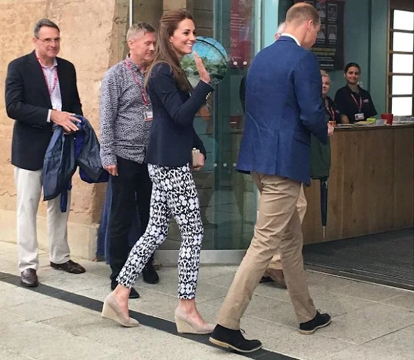 Prince William and Duchess Catherine of Cambridge visit The Isles of Scilly and at Cornwall's Eden Project, wore Smythe One Button Blazer.  GAP BI-Stretch Skinny Ankle Pants, Monsoon Fleur Wedges