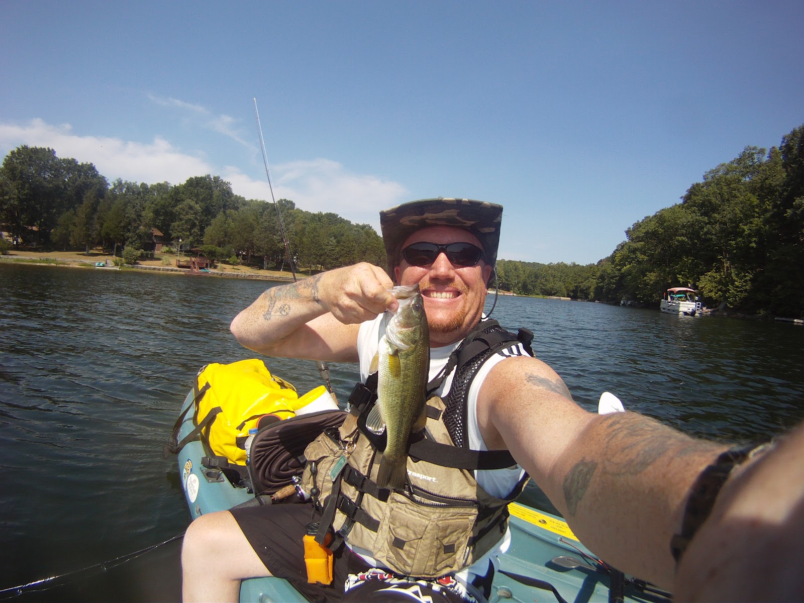 Fish Missouri July kayak fishing at Lake Sherwood, Warren County, MO