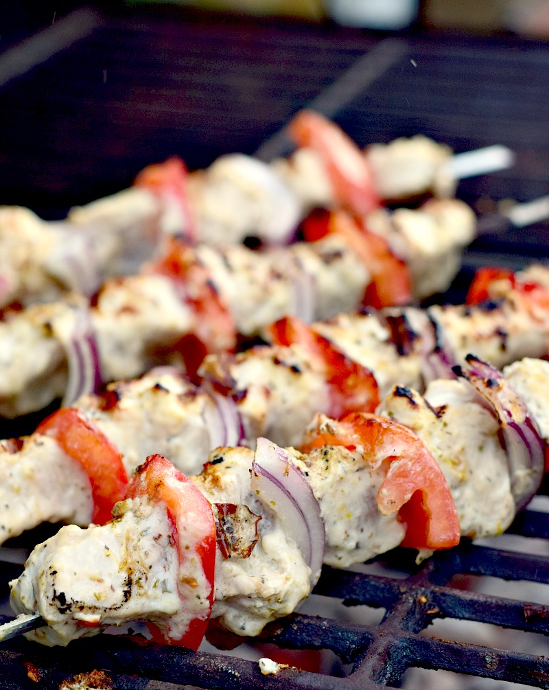 Change up that boring grilling routine with this mouthwatering chicken kabob recipe. Paired with a delicious Greek salad, it is a meal fit for a King, or Queen. #grilling #kabob #kebab #chicken #Greek #salad #recipe | bobbiskozykitchen.com