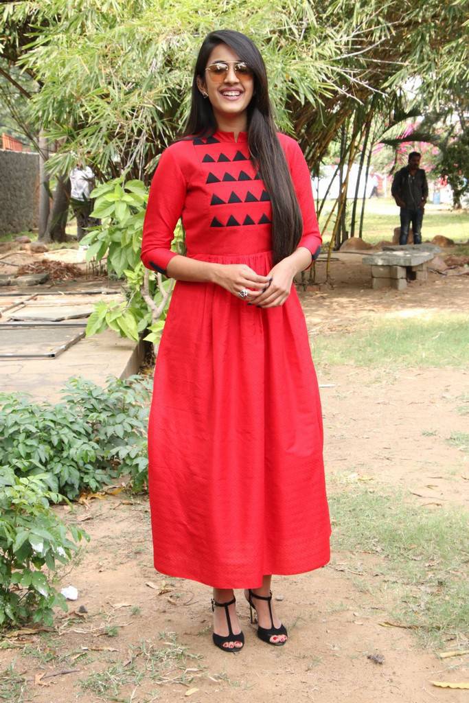 Niharika In Red Dress At Oru Nalla Naal Paathu Solren Press Meet