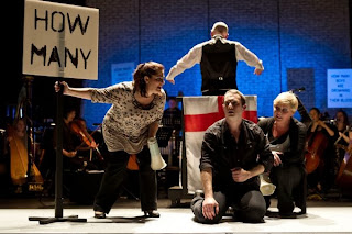 Music Theatre Wales: Greek; l-r: Sally Silver (Mum), Marcus Farnsworth  (Eddy), Louise Winter (Wife). Photo: Clive Barda.