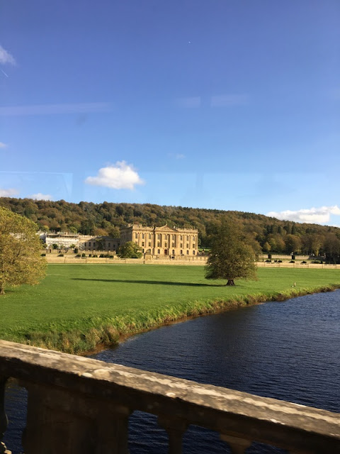 Wrapping Up England: view of Chatsworth from the bus Chatsworth house from a bridge