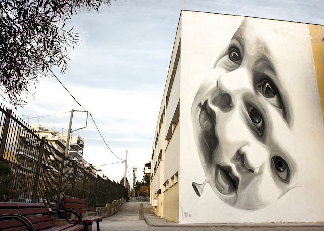 "New Future" Mural By Greek Street Artist iNO on the streets of Athens in Greece. 2