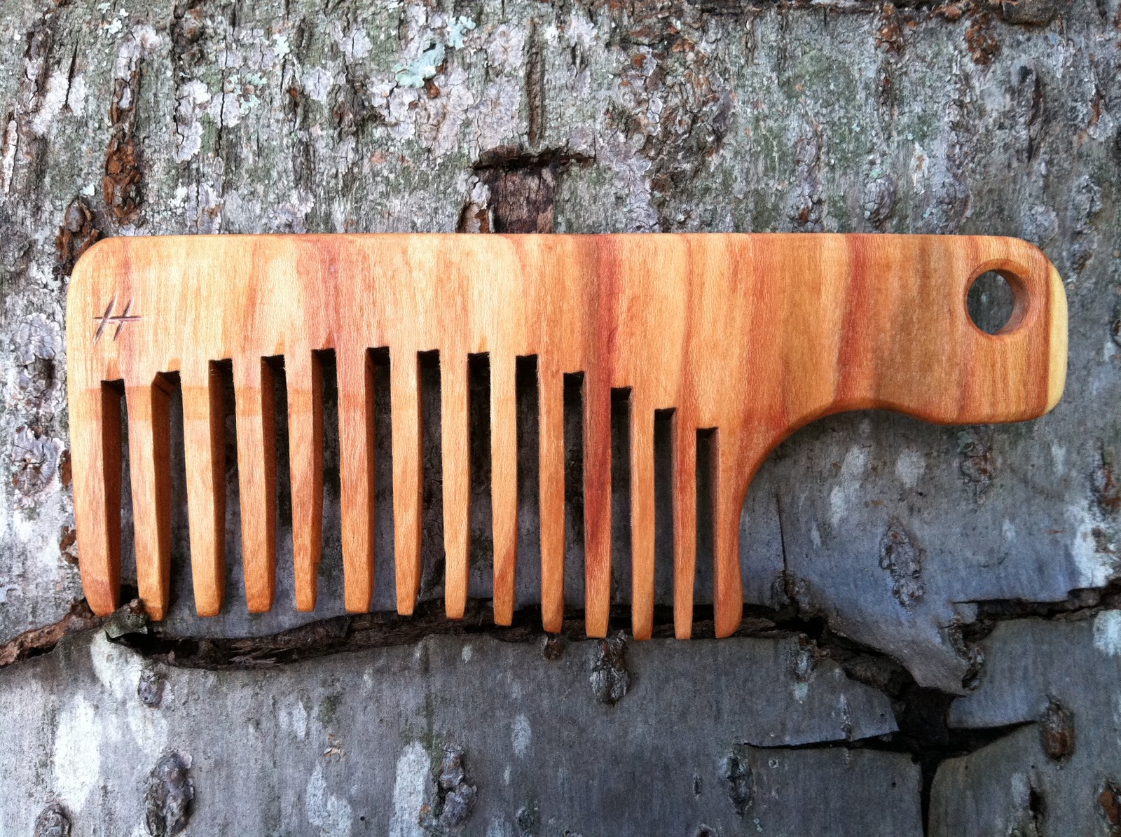 Haijun Ge Designs Wood Combs (made from cherry wood by Haijun)