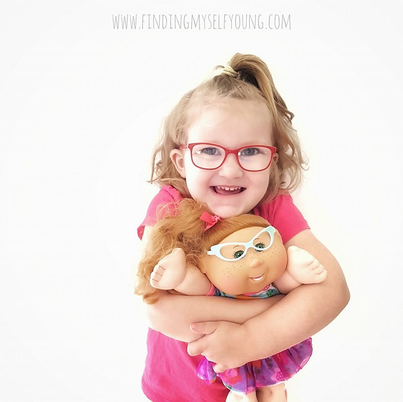 cabbage patch kid with glasses