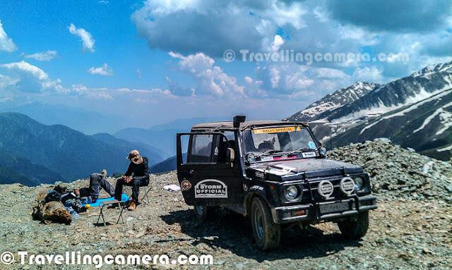 After a long time, here is another MobileGIRI PHOTO JOURNEY. This Photo Journey shares some of the Mobile clicks from Delhi Srinagar road trip with Nitin in his Gypsy... Let's check out these photographs and know more about this exciting trip to Kashmir(Heaven on Earth) from Capital City of IndiaFirst photograph of this Photo Journey is shot somewhere around Rajauri in Jammu & KashmirIt was pleasant when we started from Gurgaon and after some time it started getting hot. After some drive, we hit the highway with green fields all around. Wind was again pleasant, so we hardly used AC during this drive from Delhi to Jammu. We took enough breaks on the way and deviated from our route & went towards Amritsar by missing a turn after Phagwara... Anyways, we had not expected that after all these breaks we would be able to hit Jammu at 4:30pm, which also includes some time in finding hotel after hitting Jammu town. During this search we used MapmyIndia application and it was awesome ! A photograph of Hari Niwas Palace in Jammu. Basically we started early in the morning from Gurgaon, at around 5:15 am and reached Jammu by 4:30 pm. Jammu was our first halt and many other folks had to catch up here. So in Jammu we stayed at Hari Niwas Palce Hotel, which is another building on the right of this beautiful palace. It was a wonderful place to stay with river on back side and wonderful view on front. Atmosphere all around the place is very good and Hotel has enough space to host big parties in the lawns. Green gardens around it and mango trees were amazing. Food, Room Service and stay was wonderfulNext morning convoy started form Hari Niwas Palace Hotel at 5:00 am and this drive was wonderful through Old Mughal Road - Rajauri, Peer Ki Gali, Pulwama etc... Beautiful hills all around capped with snow and water streams flowing through them... Crossed few waterfalls at reasonable distance from main Mughal Road...Here is a photograph if high Peer-ki-Gali, which was most beautiful place on Mughal Road. Lush Green hills all around with shining whit snow on their heads & water streaming flowing down to meet the main river nearby. Am amazing sight. There were few tents installed around these hills.This whole stretch of Mughal road is best to stop for tea break and enjoy the wonderful weather around these amazing hills covered with snow. There are enough shops on the way to enjoy tea, maggie, Rajmah-chawal etcAfter climbing high hills on the way to Srinagar, after Peer ki Gali ki was downhill till a point and them almost whole drive was in plains or moderate hills. This region was again very beautiful with agricultural land all around with Apple orchards. 95% of the Mughal Road was in wonderful condition and some work was under progress in some stretches. As an example you can see the road in above photograph- quite smooth and wide..After 7 Hours of drive from Jammu to Srinagar through Old Mughal Road we reached Srinagar Golf club and then finally landed at Hotel Cetaur, which was our stay for next two days. This hotel is situated in the middle of Nagin Lake which is adjoining Dal Lake in Srinagar. Centaur has lot of green space all around and nice views to the lake. Although as per it's claims, it's not very well maintained hotel. After discussing with other folks, I got a sense that many of the five start hotels in Srinagar are finding it difficult to maintain their properties, because of negative impact on tourism in last decade. Although things are improving now and hope that all of these start making money to well matins the wonderful properties they have. Nitin's Gypsy standing just in front of the main gate of Centaur Hotel in Srinagar After some rest at hotel, I and Varun thought of having a round outside and went till Dal Lake. It was sunset time and clicked some of the sunset hues in our cameras. But the photograph above is shot with HTC Desire Hd mobile having HDR application installed. This application clicks three photographs of same frame at different exposures and combine them. This application is extremely useful while in hills because we usually get very contrasty light in hills during day time. In fact above frame was a good use-case for this application. During our stay at Srinagar, schedule was extremely tight for nights.We used to sleep at around 10:30pm-11pm and used to get up at around 2-2:30 am... Nitin is quite used to it and very good in keeping himself away from sleep while driving. On second day, we had to drive towards Sinthan Pass through Anantnag. I used to try my best for keeping away the sleep but it was very difficult for me on second day. So we started at 2:30am from Srinagar. I and Varun were sleeping and Nitin was driving through 250 kilometers. It's very normal for him but I am sure our sleepy faces must be frustrating for him... But he was always smiling when we discussed it :Here is one of the photograph of Sinthan Pass. This is exactly shot on highest point of Sinthan Pass and two local folks walking down through snow covered pass. From the size of these two people, you can imagine how big this space must be.. and probably this photograph is showing 60 degree view of Sinthan Pass..This is one of my favorite photograph shot between Sinthan Pass and Chingam. Nitin yadav, who is popular among Motorsports enthusiasts in India with his car and friend Varun. I was super-impressed to see Nitin's planing for such events/travels. His Gypsy has almost everything which he may need during tarvel. Accessories to cook on the way, mats/stools to take rest whenever required, sleeping bags & other stuff if he needs to spend night on the way in wild and what not. Of-course, a detailed Photo Journey about all these things is due here..At the same place, Nitin took out his box with gas & other stuff to make Maggie. So it was wonderful lunch in the middle of snow covered hills of kashmir - some packed snacks & hot maggie prepared by Nitin & Varun. Mainly both of them handled everything and I was there for small supports of they neededView form this place was amazing and it reminded me about Windows-Xp wallpaper with blue hills in it. I have deliberating all the closest hill to just show that how colors were changing with distance in hills. I have been to various hilly places & passes, but this was first time I was seeing hills in dark blue colors. It seemed like God is Photoshopping these hills for us to witnessAnother photograph near Sinthan Pass. For more photographs from Sinthan Pass, feel free to check out - THIVarun with his camera standing on snow topped hill at Sinthan Pass.Nitin looking into deep valley near Sinthan Pass and his Gypsy standing on the left. This location is just below Sinthan Pass and having a wonderful view to the valley with curved roads metering around 25-30 kiometers which can be seen from top. This roads goes towards Chingam. It was our second last day in Kashmir and next day we had to leave for Jammu..There are enough security all around these hills and passes. Especially for 2 days Mughal Rally which d during the same time. The Tiger Team of Nitin, Varun & VJ was there to capture the action. Apart from shooting various rally cars, SUVs & Gypsy; places around us were amazing to capture in our still & video cameras. I have also shot some videos with HTC Desire HD Mobile with will try to share soonIt's time when first stage from Sinthan Pass to Chingam has completed and we had around 1.5 hrs to take rest and gear up for back journey from Chingam to Sinthan Pass. Photo shows Nitin walking towards security personnel sitting on the other side of road and a shepherd enjoying flying cars of Mughal Rally 2012Now it was time to drive back to Srinagar which was again a long stretch to do. This stretch around Sinthan Pass and the valley was very beautifulWe reached Srinagar lake in the evening after heavy jam in the city and next day was to come back... With this amazing road journey completed with lot of fuadventure, experiences & of course Photography !!!