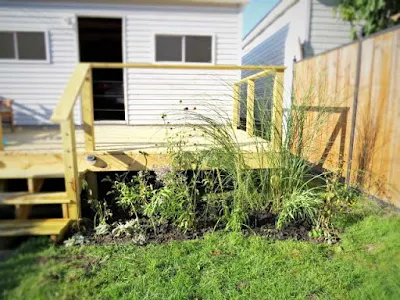 new garden plantings deck garage backyard landscaping