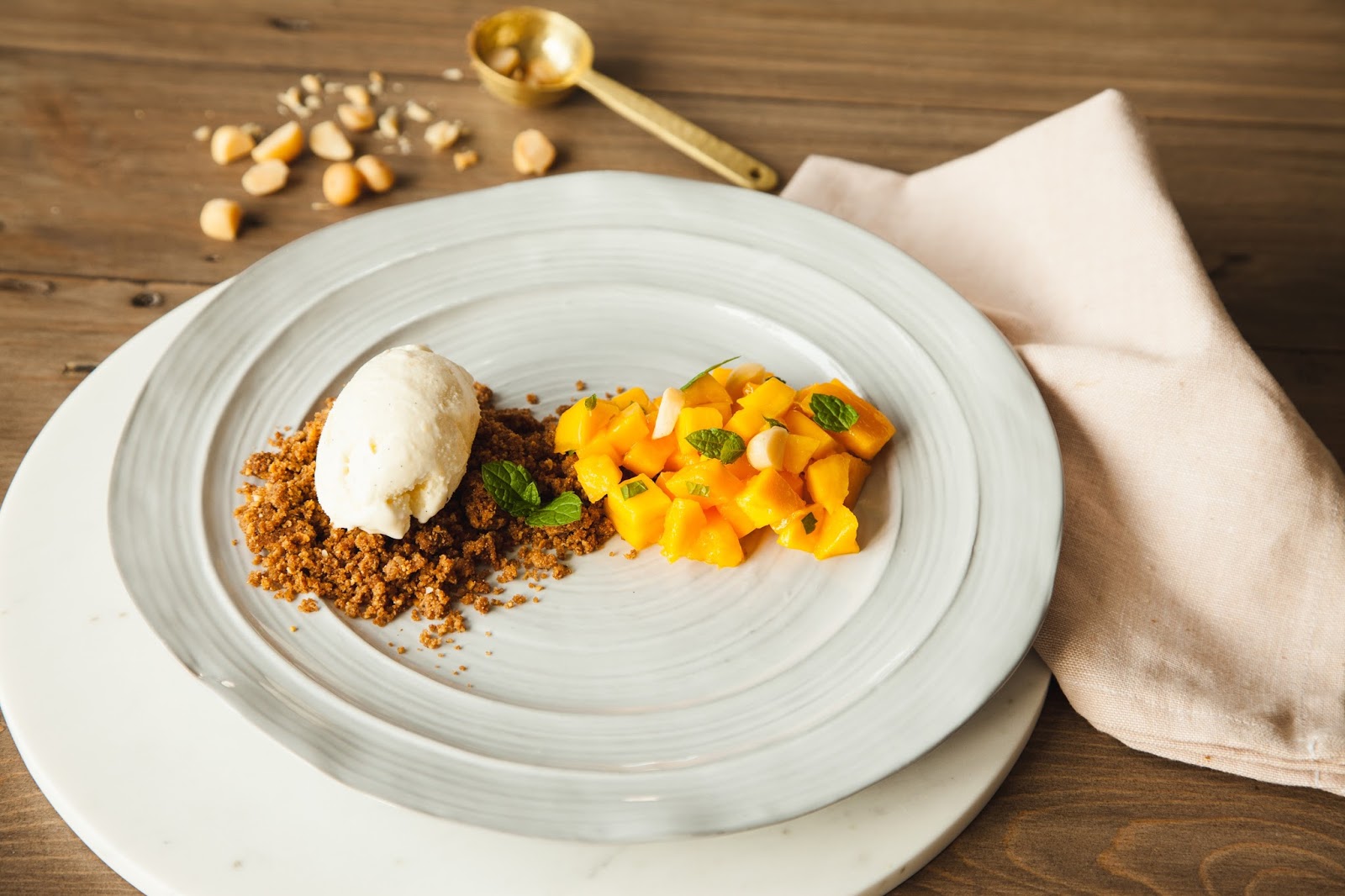 Macadamia nut ice cream with mango and speculaas crumble Dreaming of