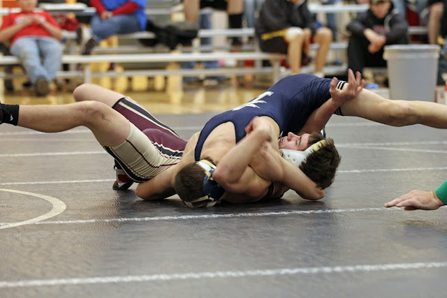wrestling world: aquinas wrestling - whitehall , westby
