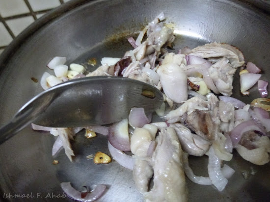 Sautéing chicken meat for my afritada