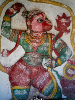 Изображение ванара на стене храма