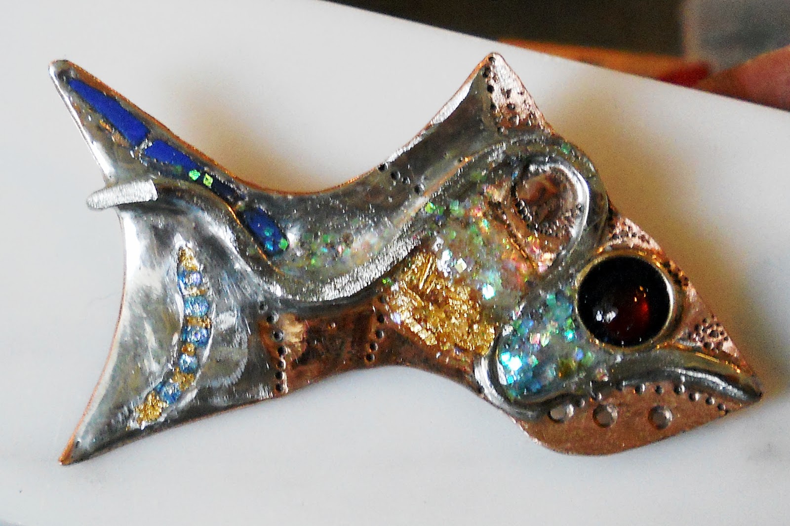 metalsmithing by W.Schweizer: iridescent fish brooch