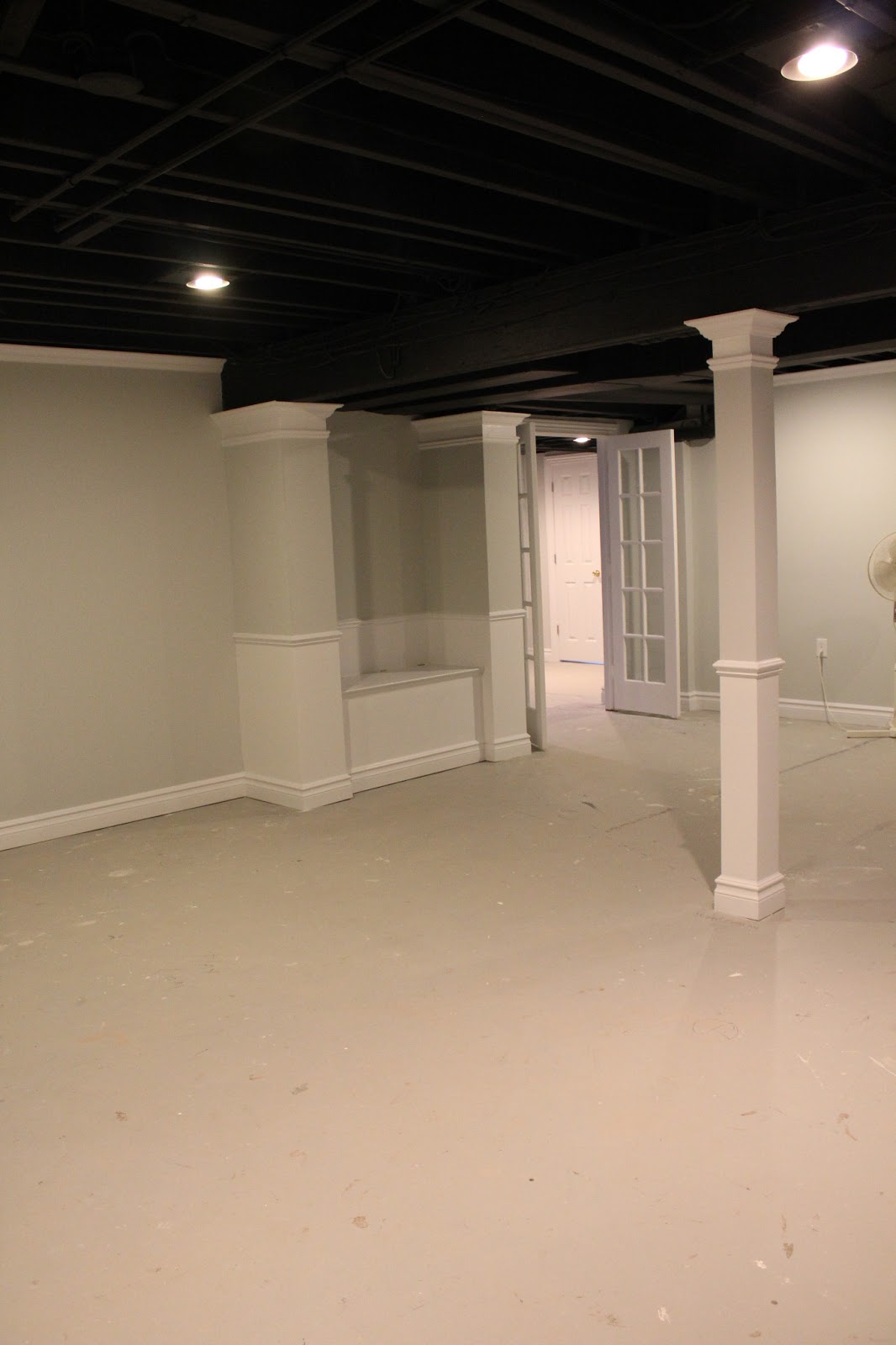 Basement Remodel With Painted Exposed Ceiling