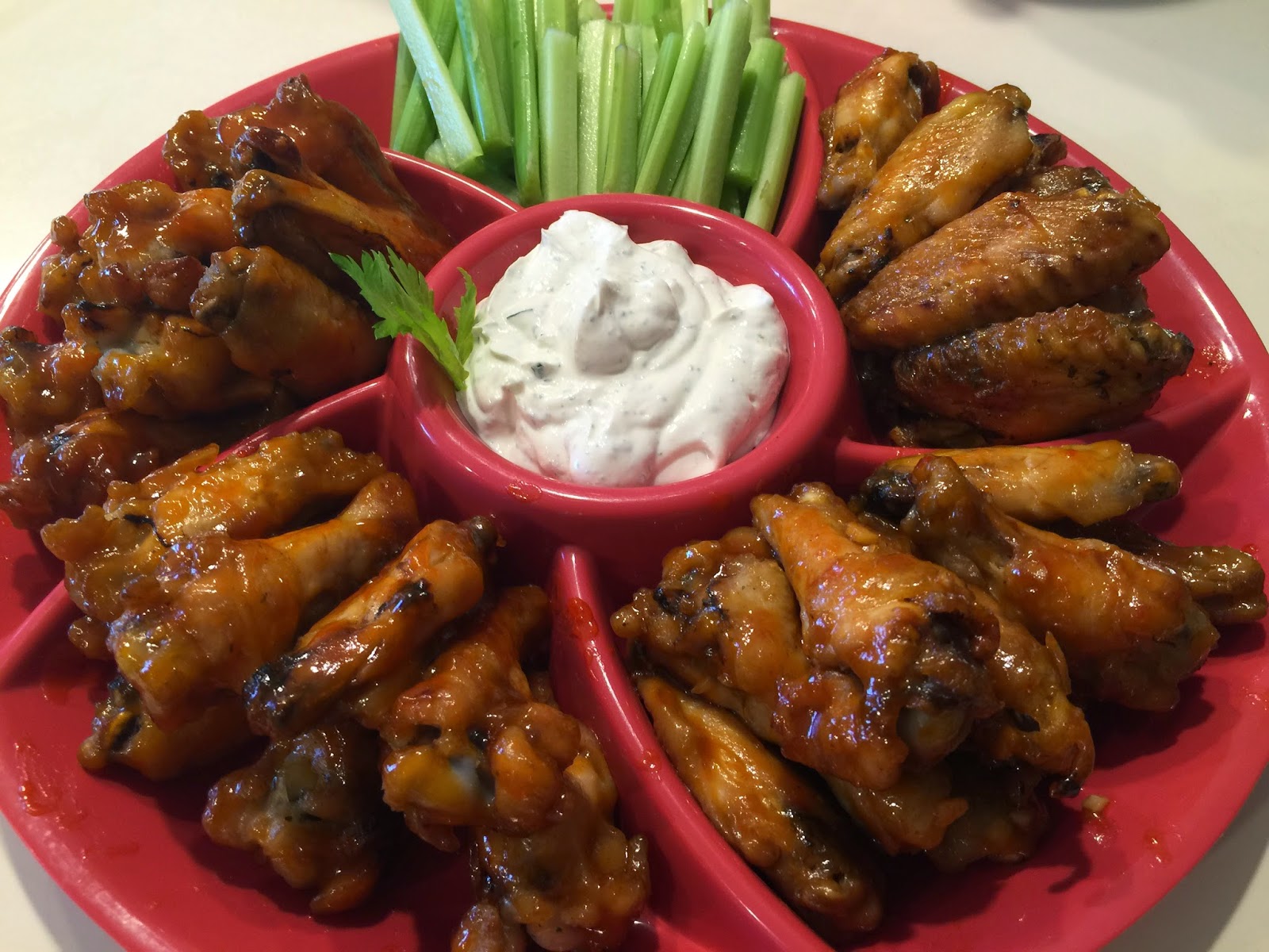 to Tevy's Kitchen Hot Wings, Honey Sriracha wings, and Thai