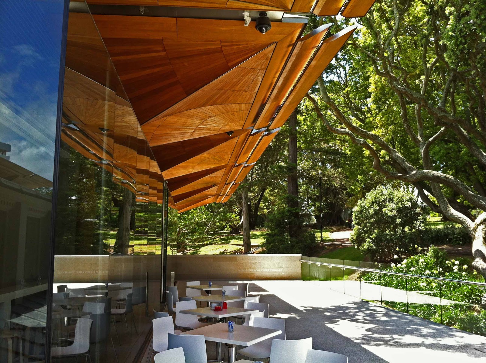 A Kiwi at the camera Coffee at the Auckland Art Gallery