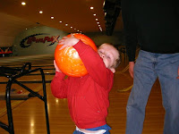 boy lifting heavy bowling ball bowlplex portsmouth