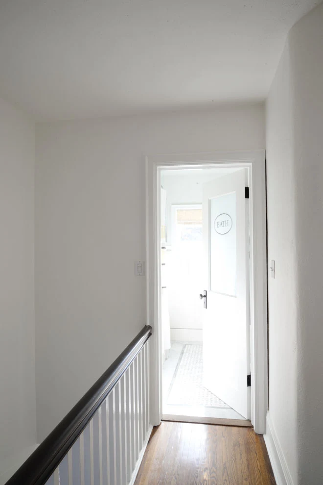 White hallway | Benjamin Moore Simply White | Ramblingrenovators.ca