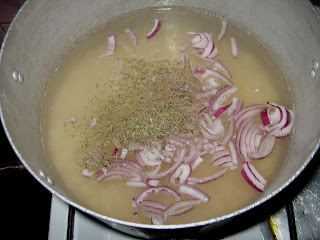[Image: washed+rice+in+a+pot+with+seasoning,+thy...onions.jpg]
