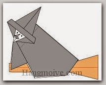 Bước 15: Đặt bà phù thuỷ lên cây chổi hoàn thành ở giai đoạn 1, vẽ mắt, mũi để hoàn thành cách xếp mụ phù thuỷ cưỡi chổi bằng giấy theo phong cách origami.
