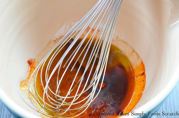 Whisk together olive oil, vinegar, smoked paprika, garlic, cumin and salt to make Sticky Chipotle Honey Sauce from Serena Bakes Simply From Scratch.