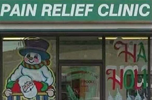 pain relief clinic pharmacy window snowman and santa display fail snowman humps santa chemist shop display funny fail happy holidays