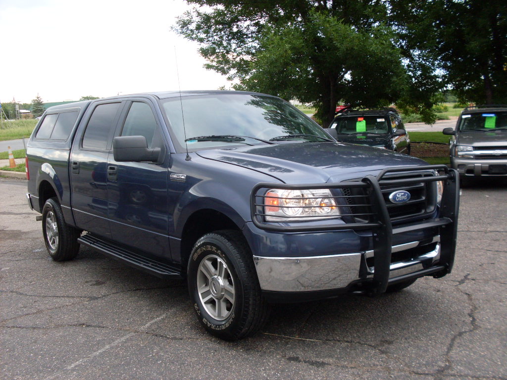 Ride Auto: 2006 Ford F150 Blue 1