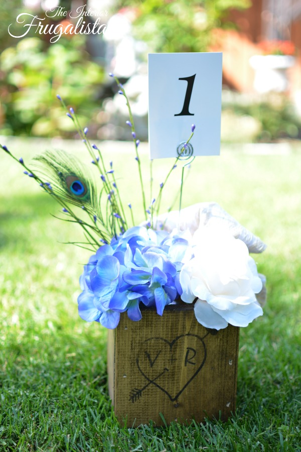 How to make simple and adorable rustic wooden carved love heart wedding centerpiece boxes, a DIY budget wedding decor idea with country-style charm.