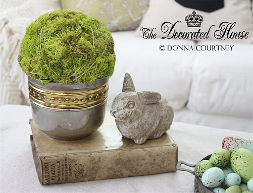 The Decorated House. Decorating for Easter. Moss Ball, Cement Bunny, Antique Vellum Book