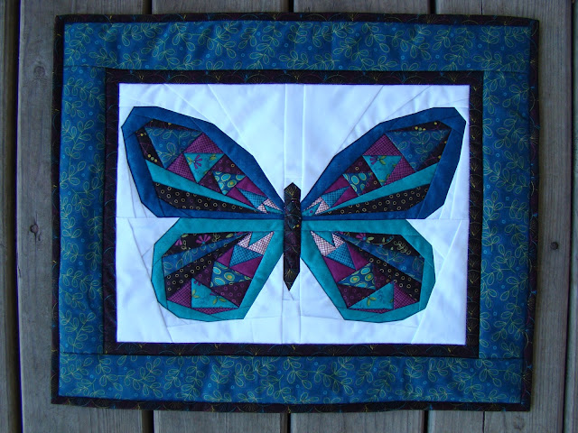 Paper pieced butterfly mini quilt