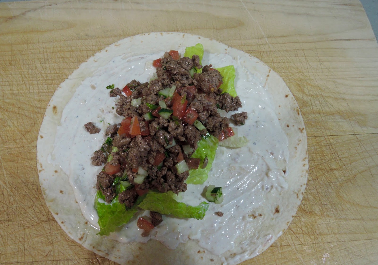 The Briny Lemon Lamb Wraps with Garlicky Yogurt Sauce