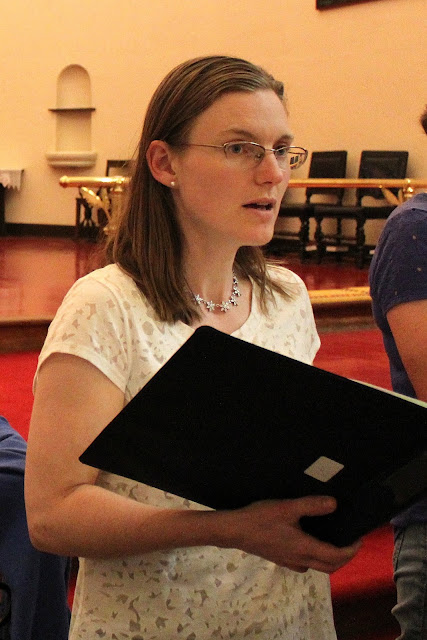 Martha Patterson singing in a rehearsal 