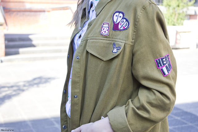 Patched parka outfit detail