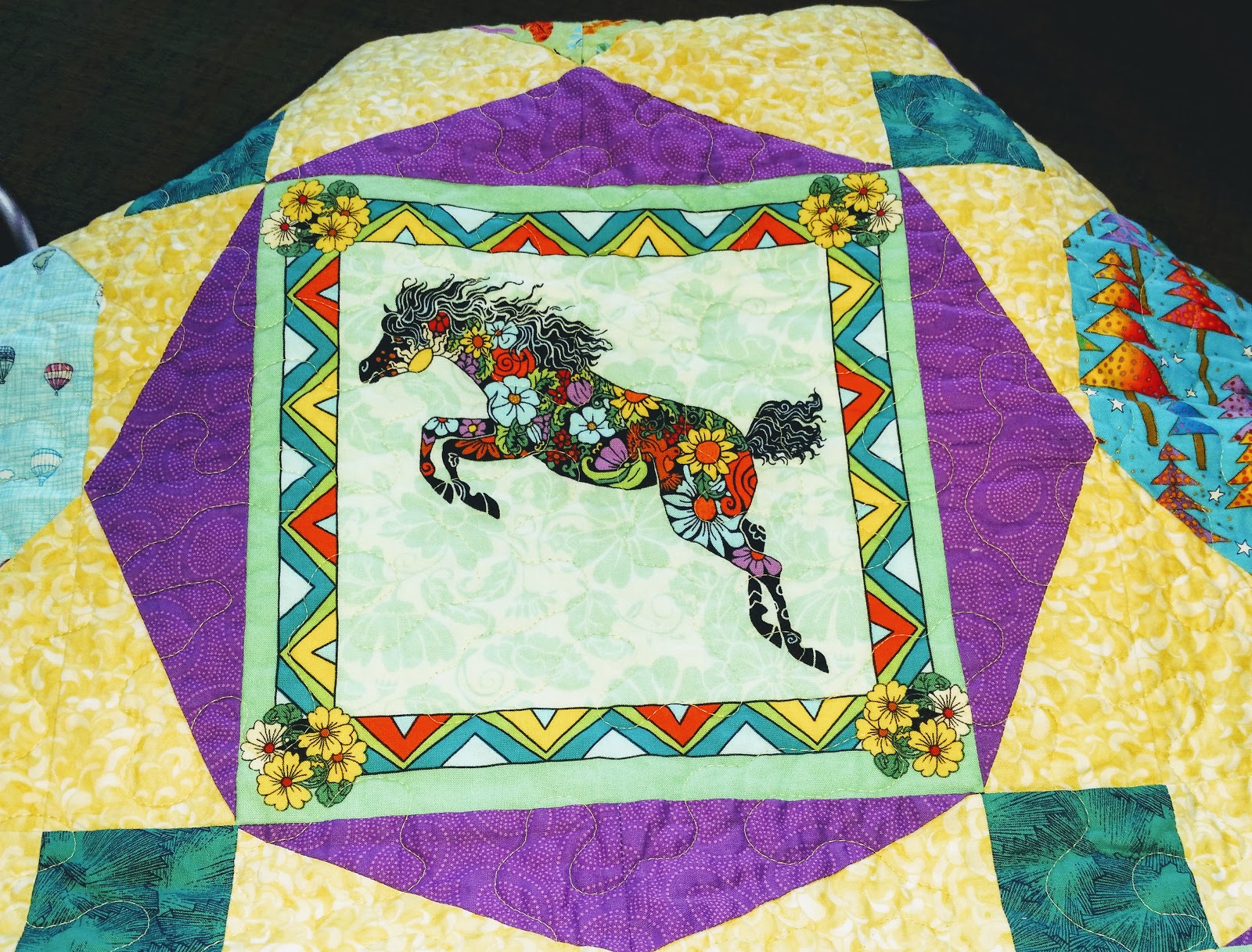 Quilt Odyssey And the painted ponies go up and down