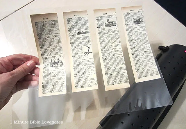 Laminating book pages by 1 Minute Bible Love Notes via I Love That Junk