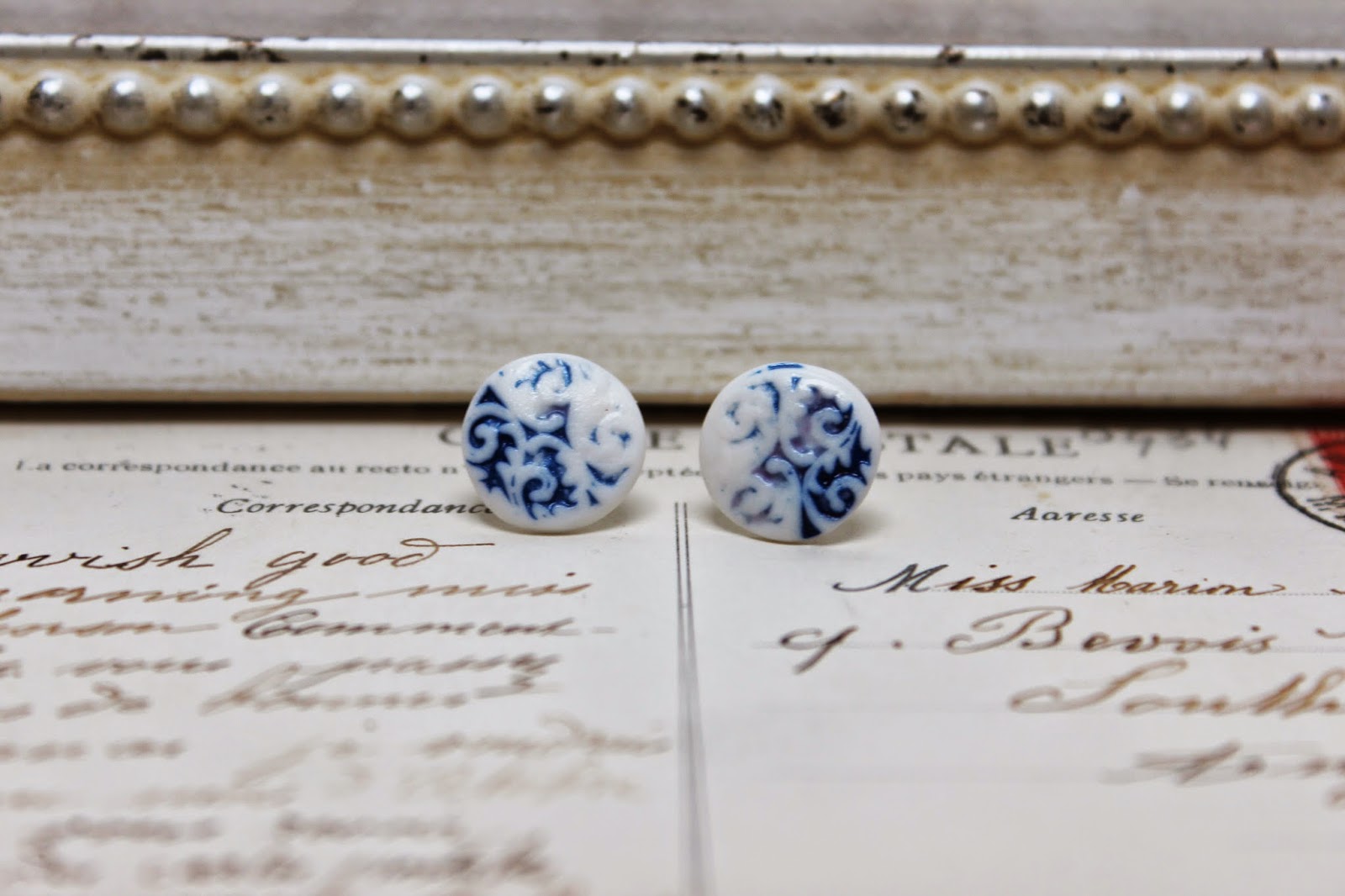 http://www.amanda-mercer.co.uk/pretty-things-for-you/blue-inlay-button-stud-earrings