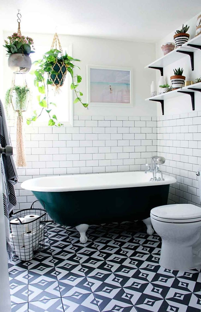 Claw foot tub and plants in bathroom- design addict mom