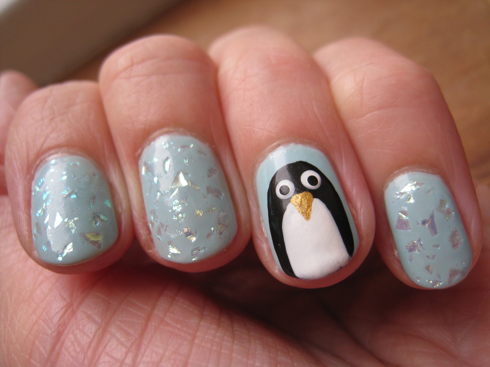 Naily perfect: Penguins and snowflakes!