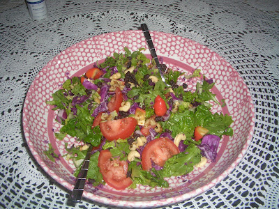 arugula, tomatoes, red cabbage and raw cashews