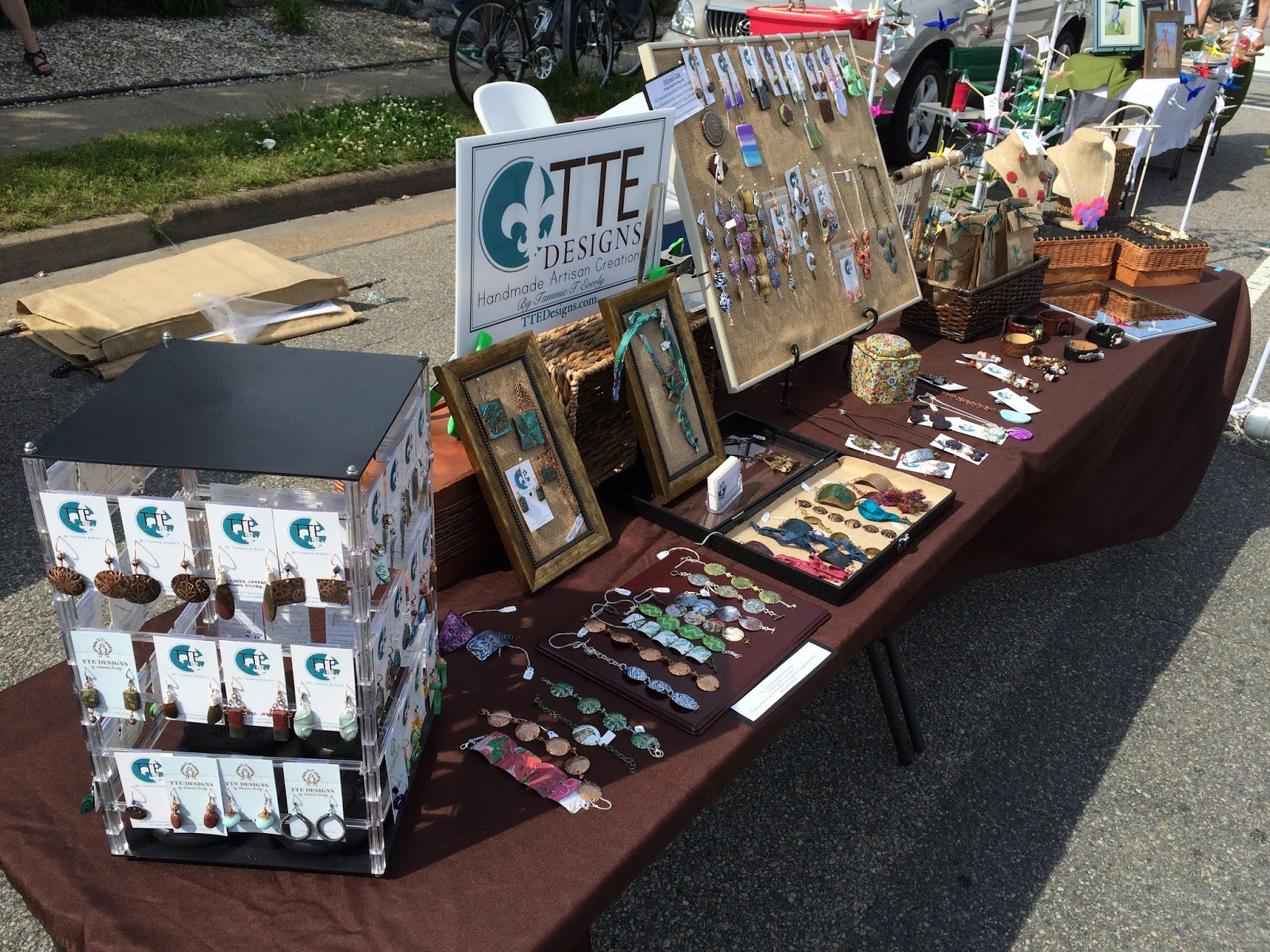 Securing a Market Umbrella at an Outdoor Craft Show