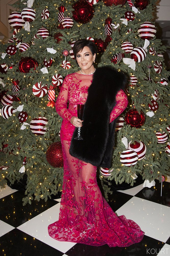 Caitlyn and Kris Jenner rock matching red dresses at her Christmas party
