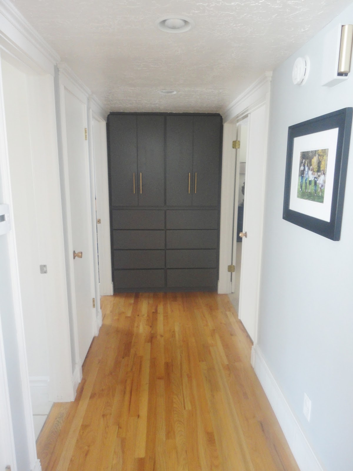 daly designs: HOW TO: Paint Hall Cabinets
