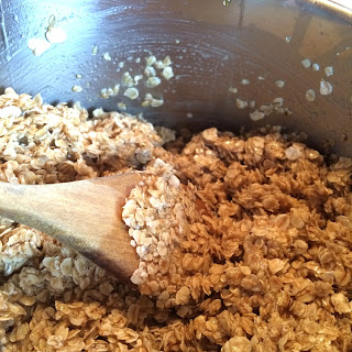 Stirring flapjack mix with wooden spoon